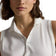 RLX Ralph Lauren Women's Tour Performance Sleeveless Golf Polo Shirt - Ceramic White